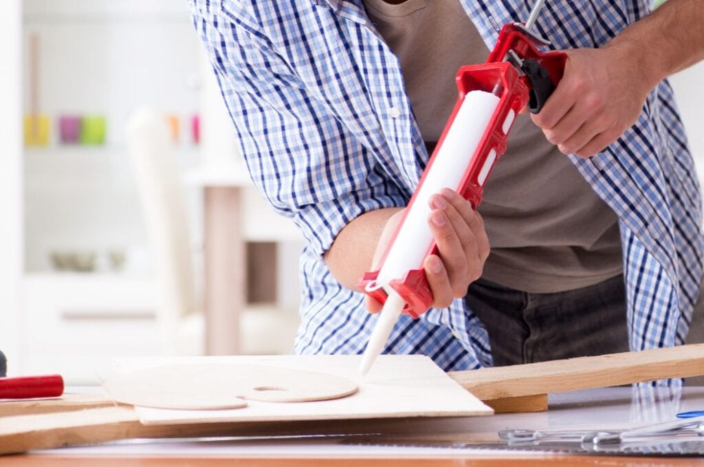 Young man in woodworking hobby concept